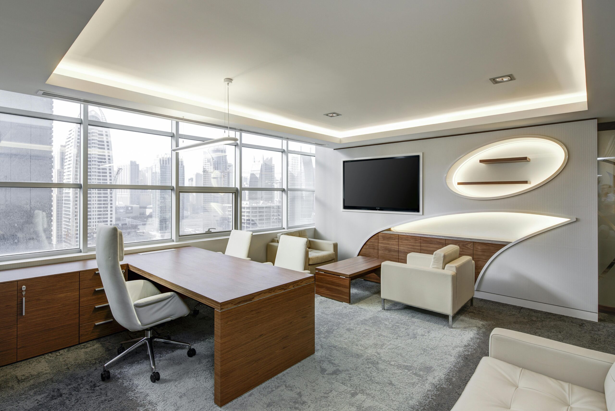 Projects Sleek office space featuring contemporary furniture and city skyline views, ideal for professionals.